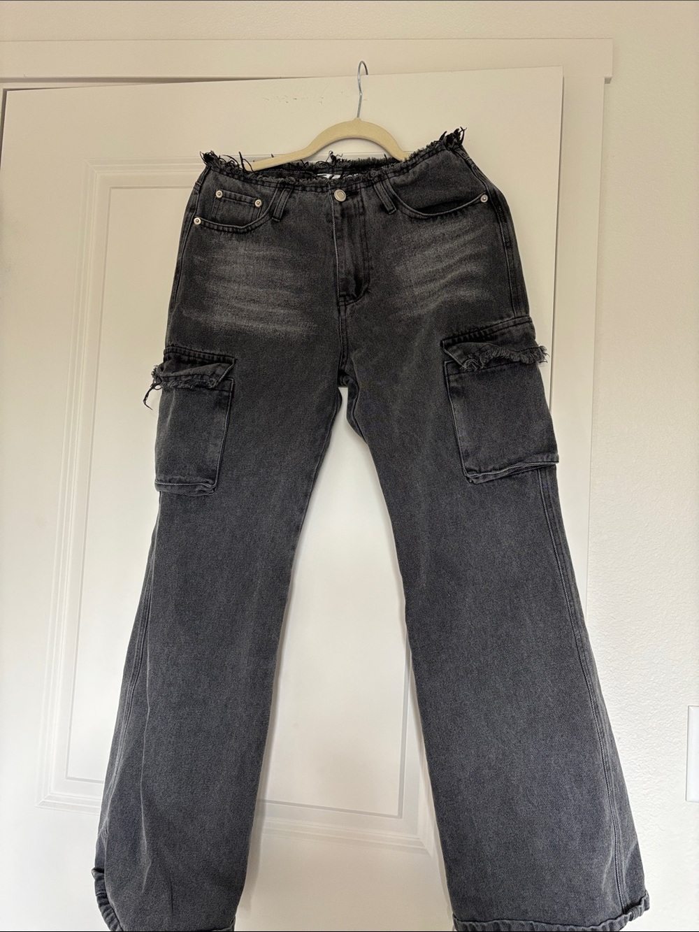 High-Rise Black Flare Cargo Jeans with Distressed Waist